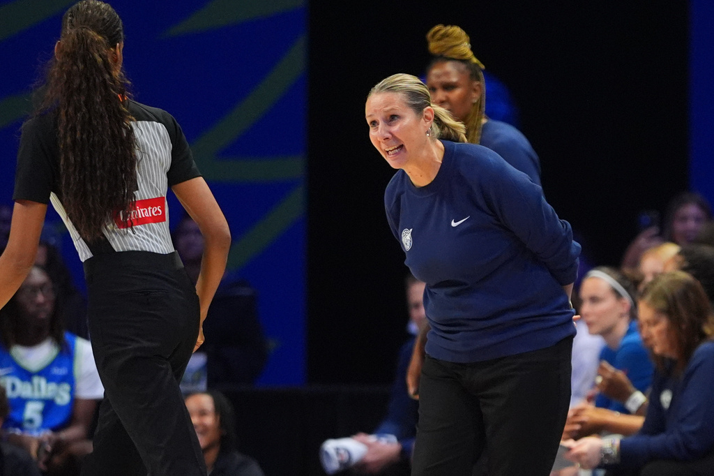 Minnesota Lynx head coach Cheryl Reeve, right, questions a call during the second half of a WNBA basketball game against the Dallas Wings in Arlington, Texas, Sunday, June 28, 2026. (AP Photo/LM Otero)