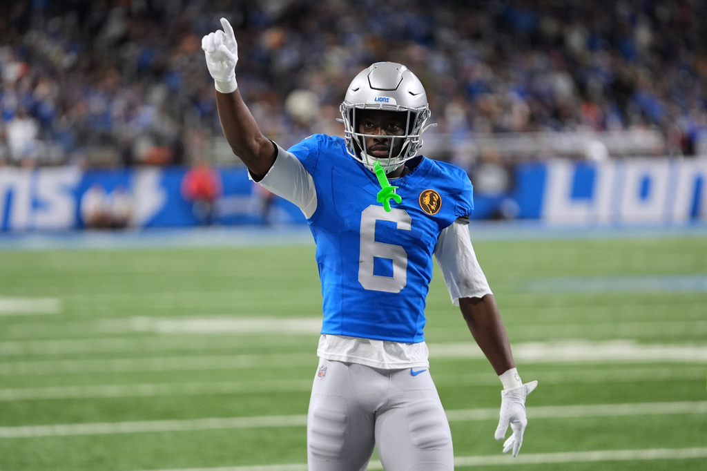 FILE - Detroit Lions cornerback Terrion Arnold reacts to a play against the Green Bay Packers during an NFL football game in Detroit, Nov. 27, 2025. (AP Photo/Paul Sancya, File)