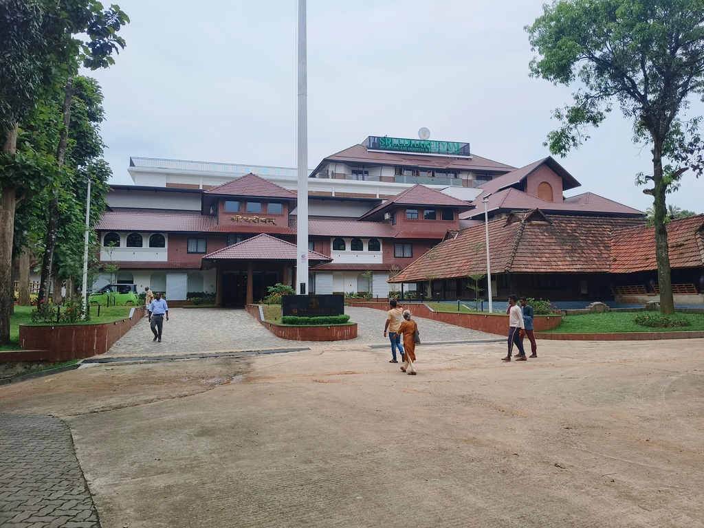 People walk outside the Sreedhareeyam Ayurvedic hospital in Koothattukulam, Kerala, India, where former Kenyan Prime Minister Raila Odinga, was undergoing treatment recently, Wednesday, Oct.15, 2025. (AP Photo)