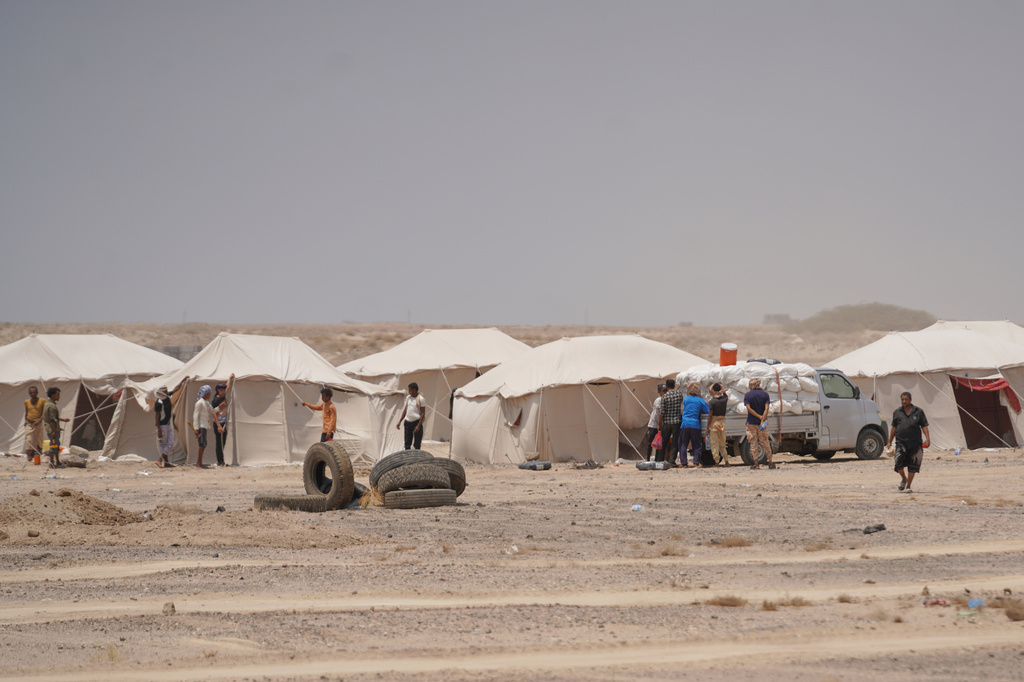 Displaced Yemenis are seen at Al-Firdaws camp in Ras Imran, just outside Aden, Yemen, Monday, Sept. 14, 2026. (AP Photo/Abdulnasser Alseddik)
