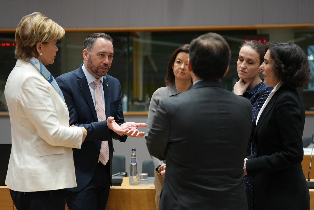 Belgium's Foreign Minister Maxime Prevot, second left, speaks with from left, Latvia's Foreign Minister Baiba Braze, Slovenia's Foreign Minister Tanja Fajon, Romania's Foreign Minister Oana-Silvia Toiu, European Commissioner for Preparedness and Crisis Hadja Lahbib and Spain's Foreign Minister Jose Manuel Albares Bueno during a meeting of EU foreign ministers at the European Council building in Brussels, Monday, Dec. 15, 2025. (AP Photo/Virginia Mayo)