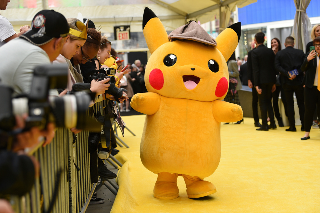 FILE - A person in a Pikachu character costume attends the premiere of "Pokemon Detective Pikachu" at Military Island in Times Square, May 2, 2019, in New York. (Photo by Evan Agostini/Invision/AP, File)