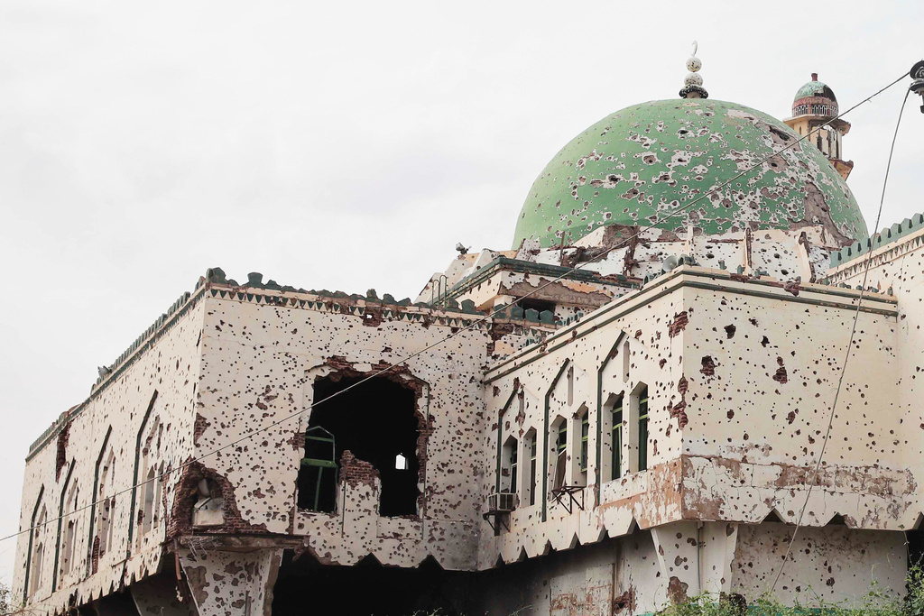 The Martyr mosque, previously damaged during fighting between the Sudanese Armed Forces (SAF) and the paramilitary Rapid Support Forces (RSF), in Khartoum, Sudan, Monday, Aug. 11, 2025. (AP Photo/Marwan Ali)