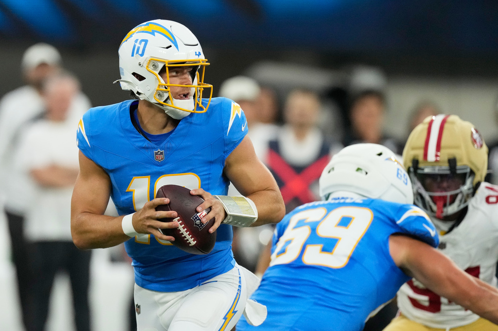 Los Angeles Chargers quarterback Justin Herbert (10) drops back to pass during the first half of a preseason NFL football game against the San Francisco 49ers, Thursday, Aug. 20, 2026, in Inglewood, Calif. (AP Photo/Mark J. Terrill)