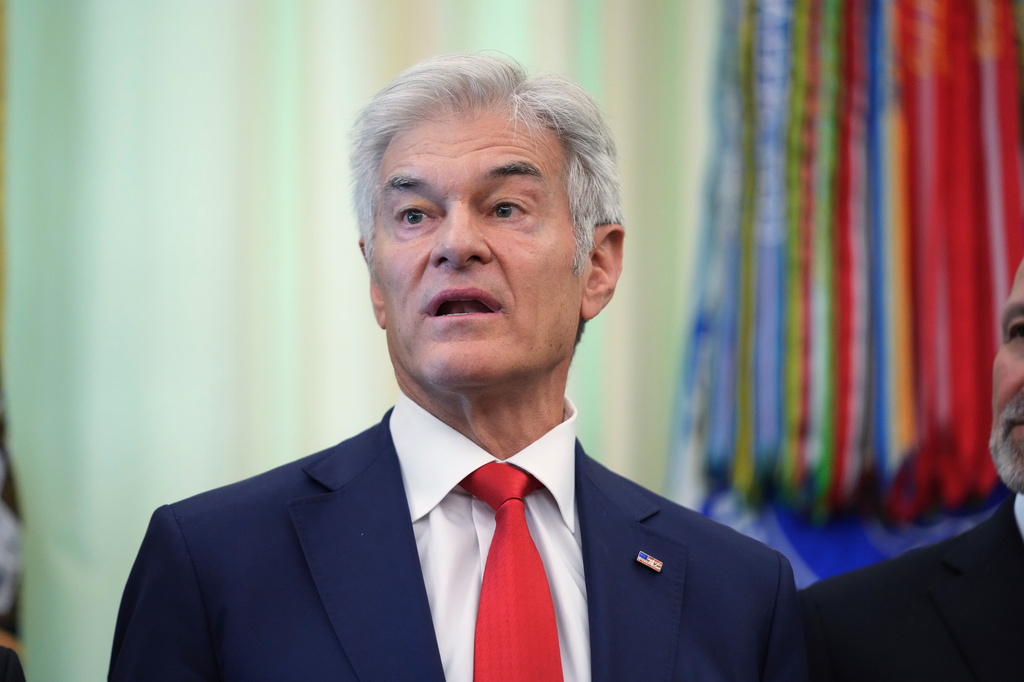 Centers for Medicare & Medicaid Services administrator Dr. Mehmet Oz speaks speaks during an event on health care affordability in the Oval Office at the White House, Thursday, April 23, 2026, in Washington. (AP Photo/Mark Schiefelbein)