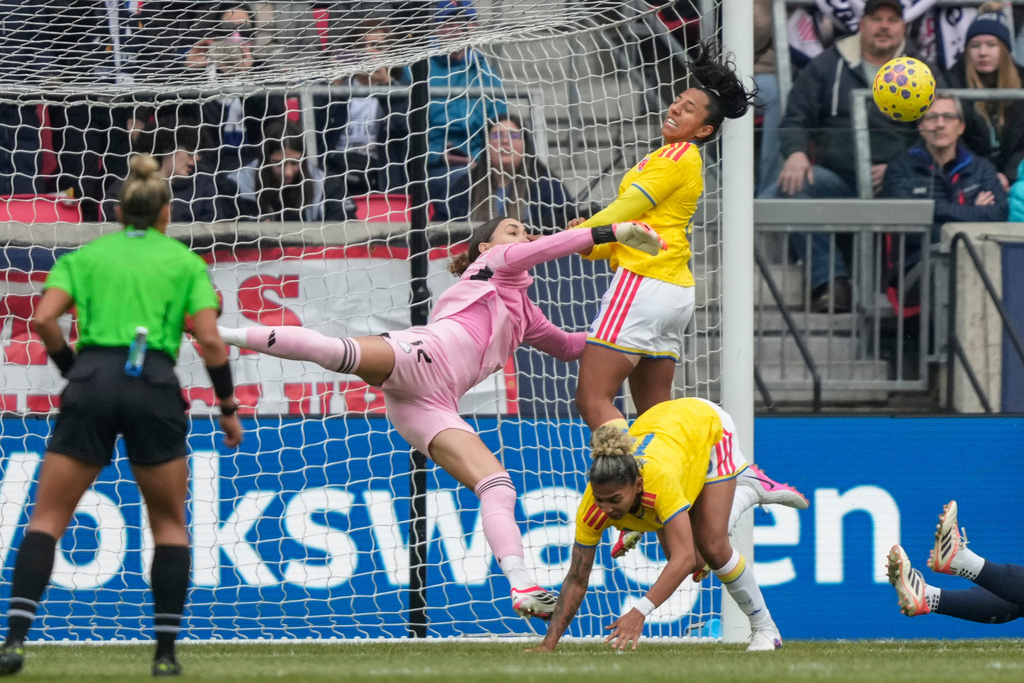 Colombia goalkeeper Claudia Dickey (1) blocks a shot during the first half of a SheBelieves Cup women's soccer match against the United States, Saturday, March 7, 2026, in Harrison, N.J. (AP Photo/Yuki Iwamura)