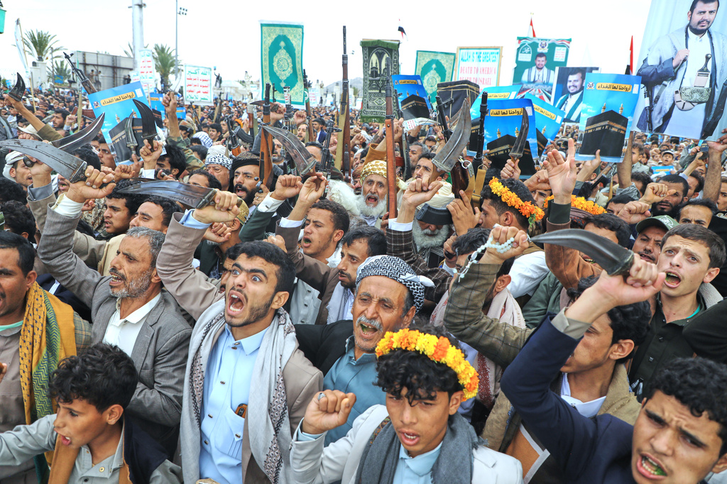 Supporters of Yemen's Houthi rebels shout slogans during a rally in support of the group and to protest Saudi Arabia's accusation that the Houthis targeted Islam's holiest site of Mecca, in Sanaa, Yemen, Friday, Sept. 18, 2026. (AP Photo/Osamah Abdulrahman)