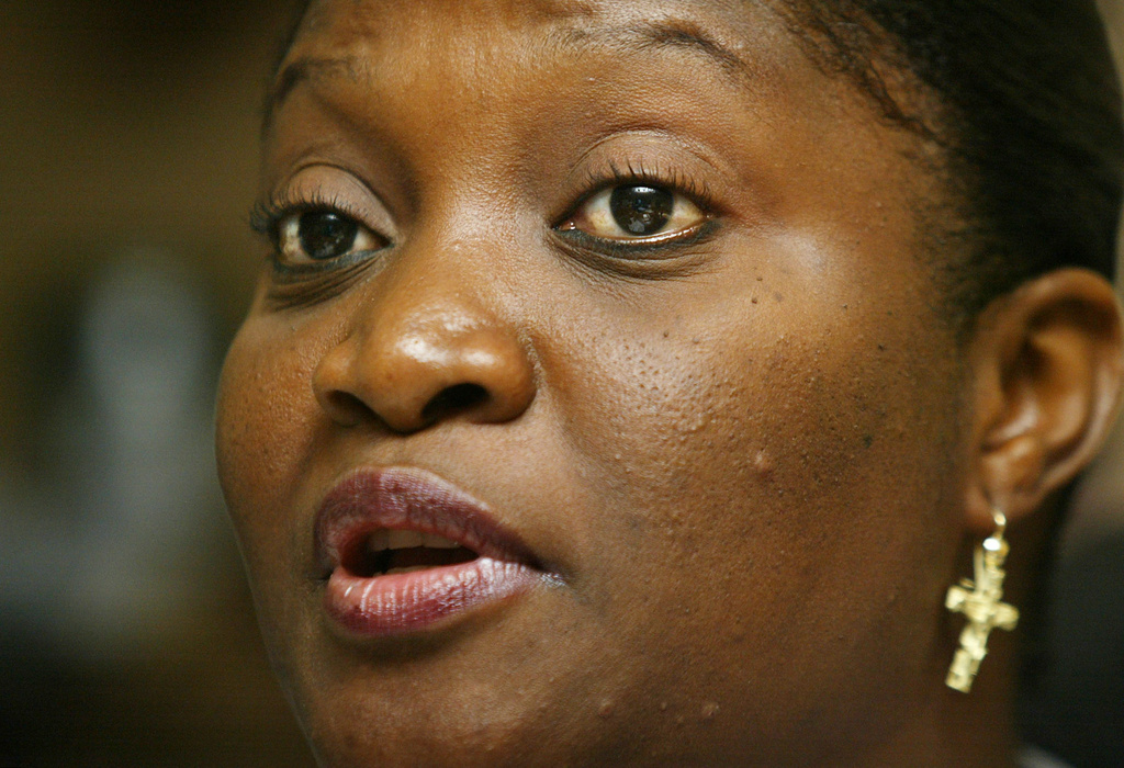 FILE - Liberian first lady Jewel Howard Taylor speaks to journalists at the ruling National Patriotic Party headquarters in the Liberian capital Monrovia Friday, July 11, 2003. (AP Photo/Ben Curtis,File)