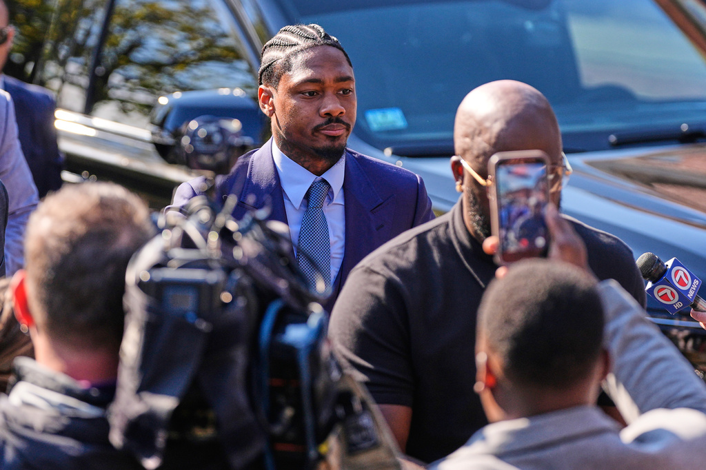Former New England Patriots wide receiver Stefon Diggs arrives at Norfolk County District Court, Monday, May 4, 2026, in Dedham, Mass. (AP Photo/Charles Krupa)
