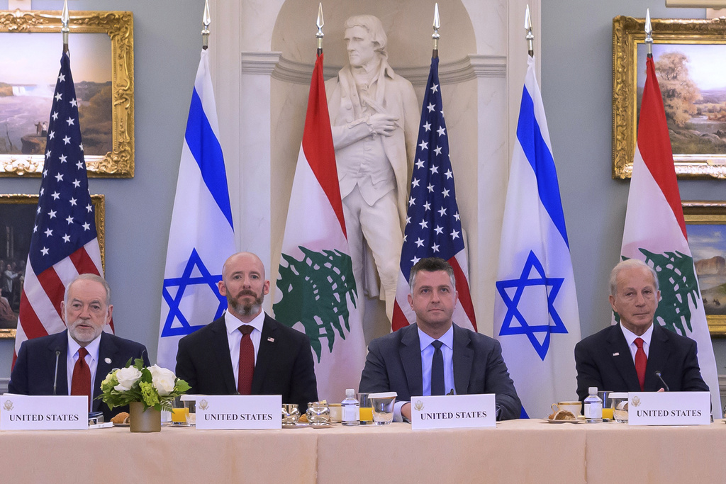 United States Ambassador to Israel Mike Huckabee, left, is joined by second from left: State Department Chief of Staff Dan Holler, Sr., State Department Counselor and Director, Office of Policy Planning Michael A. Needham and United States Ambassador to Lebanon Michel Issa, as they meet with Israeli Ambassador to the United States Yechiel Leiter and Lebanese Ambassador to the United States Nada Hamadeh, at the State Department, Tuesday, June 2, 2026, in Washington. (AP Photo/Rod Lamkey, Jr.)
