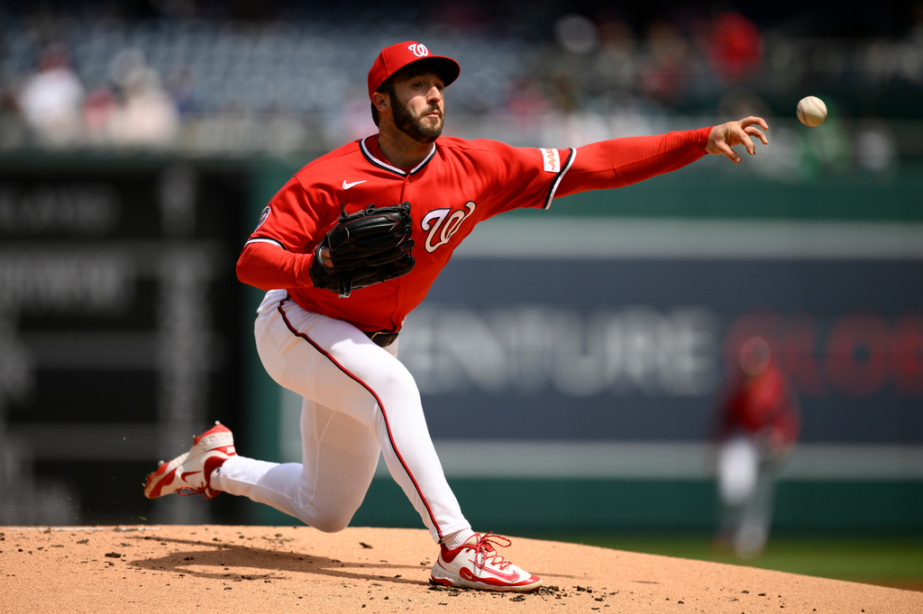 Washington Nationals starting pitcher PJ Poulin throws during the first inning of a baseball game against the San Francisco Giants, Sunday, April 19, 2026, in Washington. (AP Photo/Nick Wass)