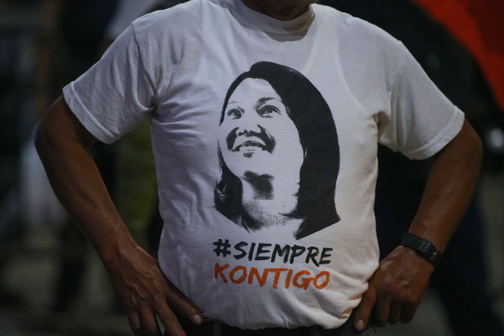 A supporter of presidential candidate Keiko Fujimori of the Popular Force party wears a shirt with her image on it during a campaign rally in Huacho, Peru, Tuesday, June 2, 2026. (AP Photo/Guadalupe Pardo)