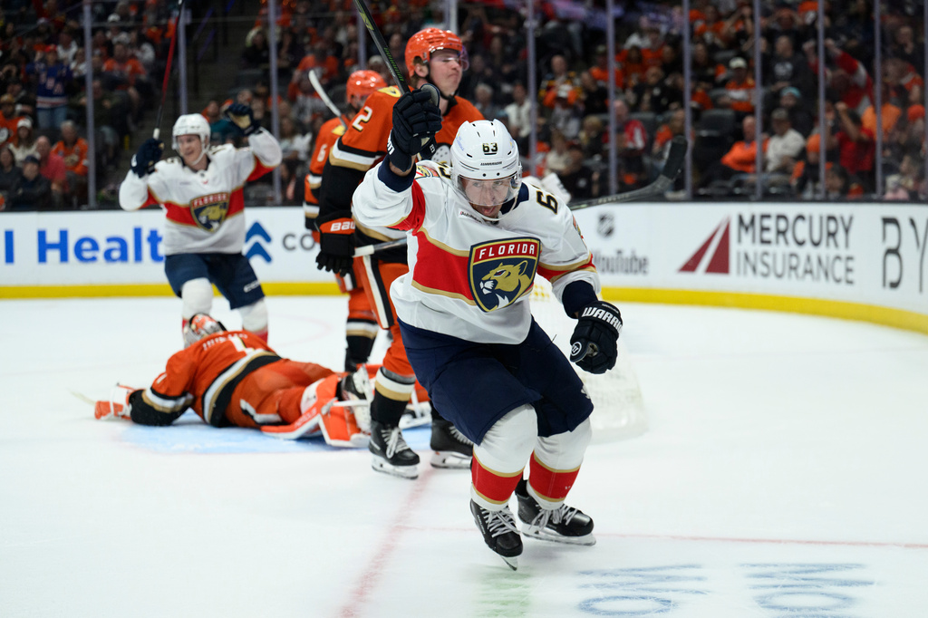 Florida Panthers left wing Brad Marchand (63) celebrates his goal during an NHL hockey game against the Anaheim Ducks, in Anaheim, Calif. Sunday, Oct. 4, 2026. (AP Photo/Kyusung Gong)