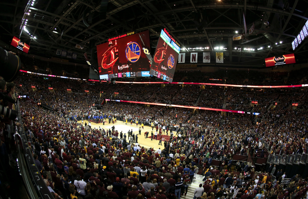 FILE - Fans stand before Game 3 of basketball's NBA Finals between the Cleveland Cavaliers and the Golden State Warriors in Cleveland, Wednesday, June 8, 2016. (AP Photo/Ron Schwane, File)
