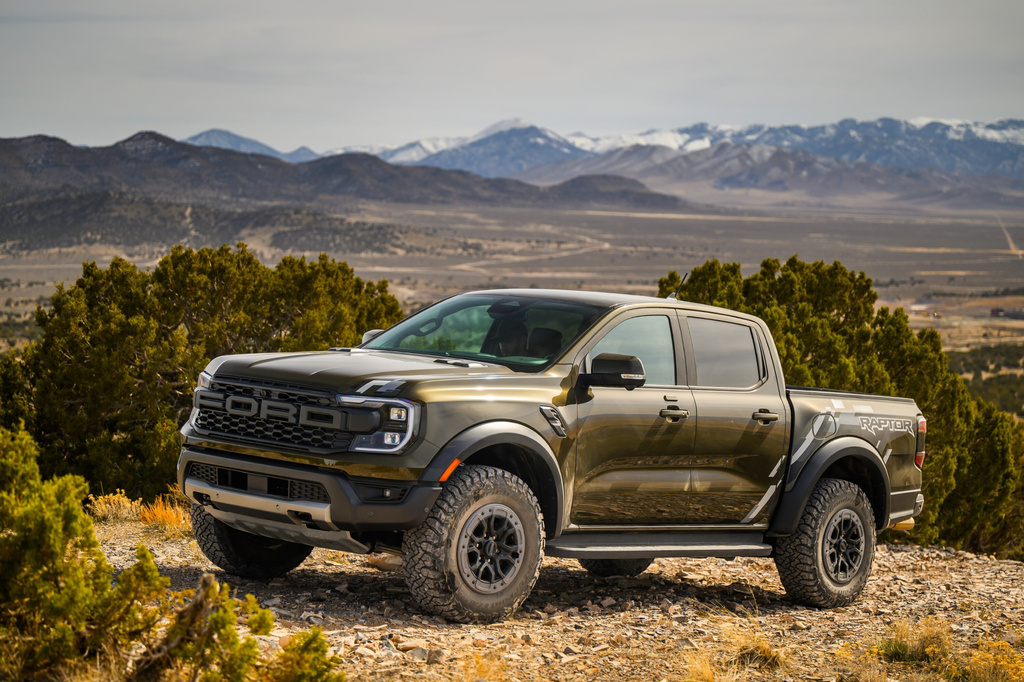 This photo provided by Ford shows the Ranger Raptor pickup. The Raptor tops the Ranger lineup with its specialized off-roading hardware and powerful V6 engine. (Courtesy of Ford Motor Co. via AP)