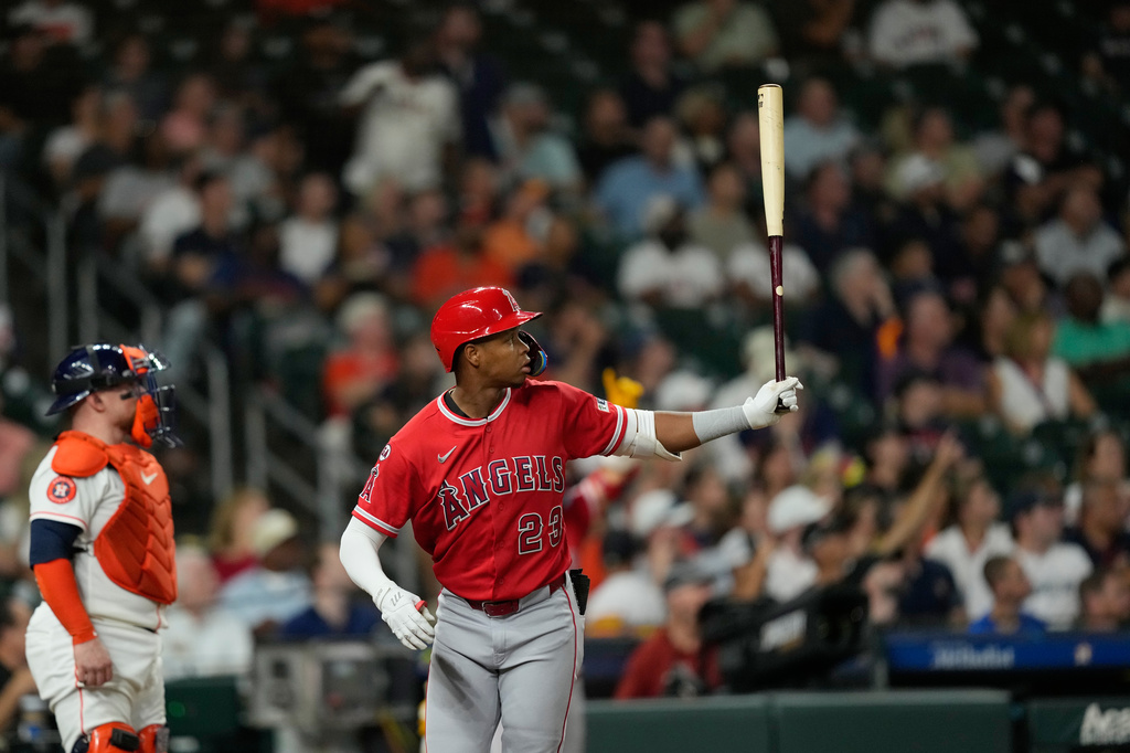 Los Angeles Angels' Denzer Guzman watches his two-run double, on fan interference, during the fourth inning of a baseball game against the Houston Astros Wednesday, Aug. 19, 2026, in Houston. (AP Photo/David J. Phillip)