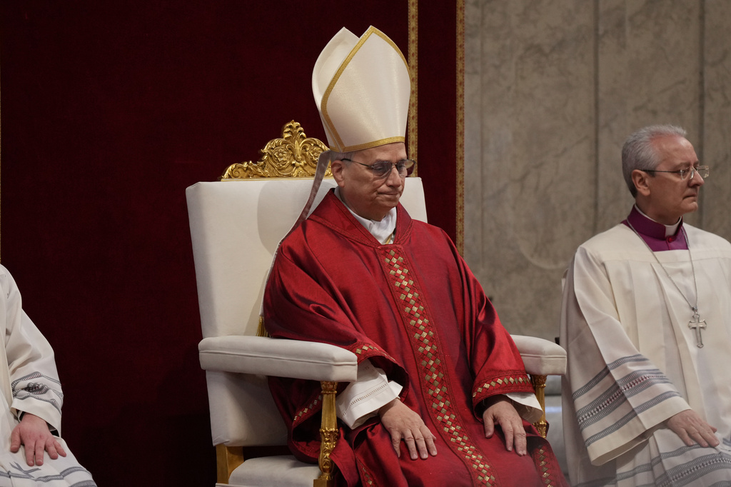 Pope Leo XIV attends the Celebration of the Passion of the Lord in St. Peter's Basilica at the Vatican on Catholic Good Friday, Friday, April 3, 2026 (AP Photo/Andrew Medichini)