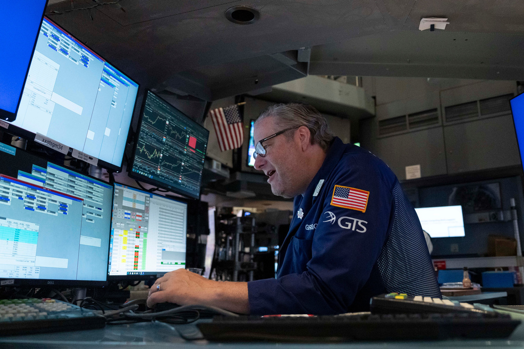 Specialist Gregg Maloney works on the floor of the New York Stock Exchange, Monday, Aug. 17, 2026, in New York. (AP Photo/Yuki Iwamura)