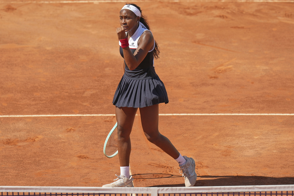 FILE - United States' Coco Gauff reacts as she plays Britain's Emma Raducanu during their tennis match at the Italian Open at the Foro Italico in Rome, May 12, 2025. (AP Photo/Alessandra Tarantino, File)