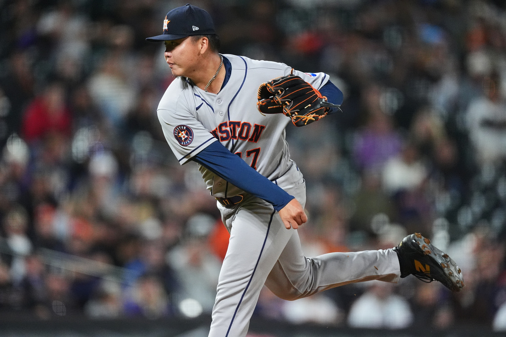 Houston Astros relief pitcher Kai-Wei Teng works against the Colorado Rockies in the seventh inning of a baseball game Tuesday, April 7, 2026, in Denver. (AP Photo/David Zalubowski)