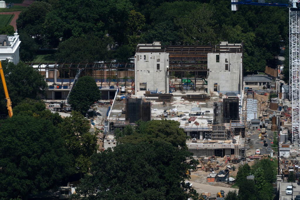 The new White House ballroom under construction, built on the demolished East Wing, is pictured, as seen from the Washington Monument, Sunday, August. 23, 2026, in Washington. (AP Photo/Manuel Balce Ceneta)