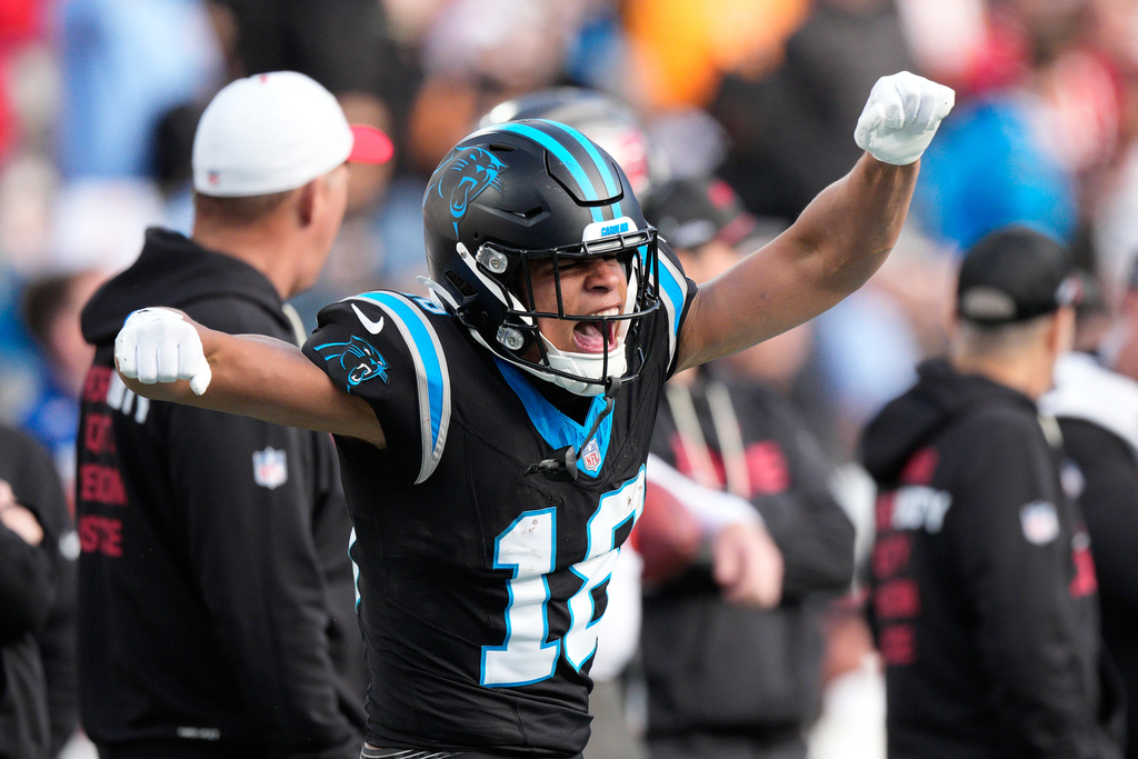 Carolina Panthers wide receiver Jalen Coker celebrates after a catch against the Tampa Bay Buccaneers during the second half of an NFL football game, Sunday, Dec. 21, 2025, in Charlotte, N.C. (AP Photo/Jacob Kupferman)