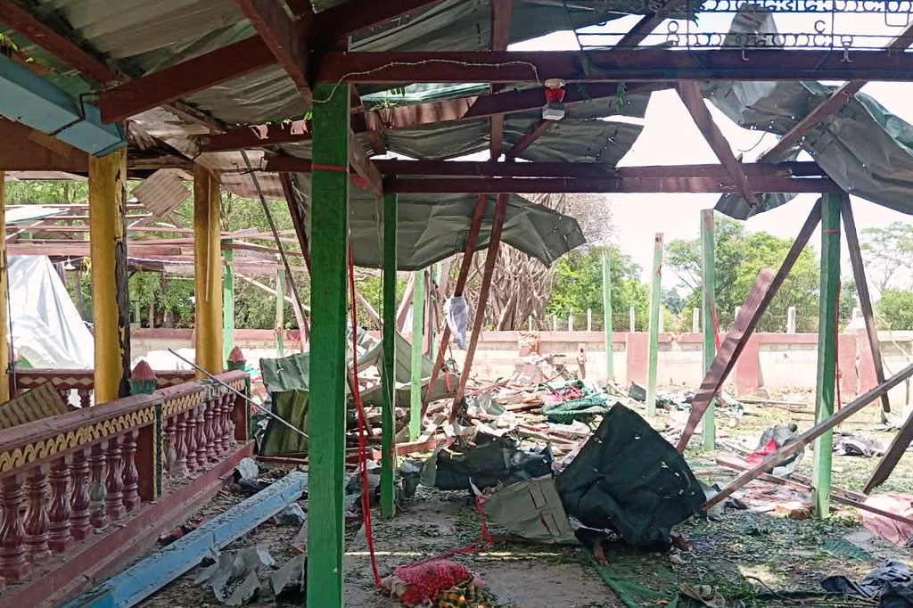 Debris litters a Buddhist monastery after an airstrike hit Swel Le Oh village in Myaung Township, Sagaing Region, Myanmar, on Friday, Aug. 21, 2026. (Ko Nway Oo via AP)