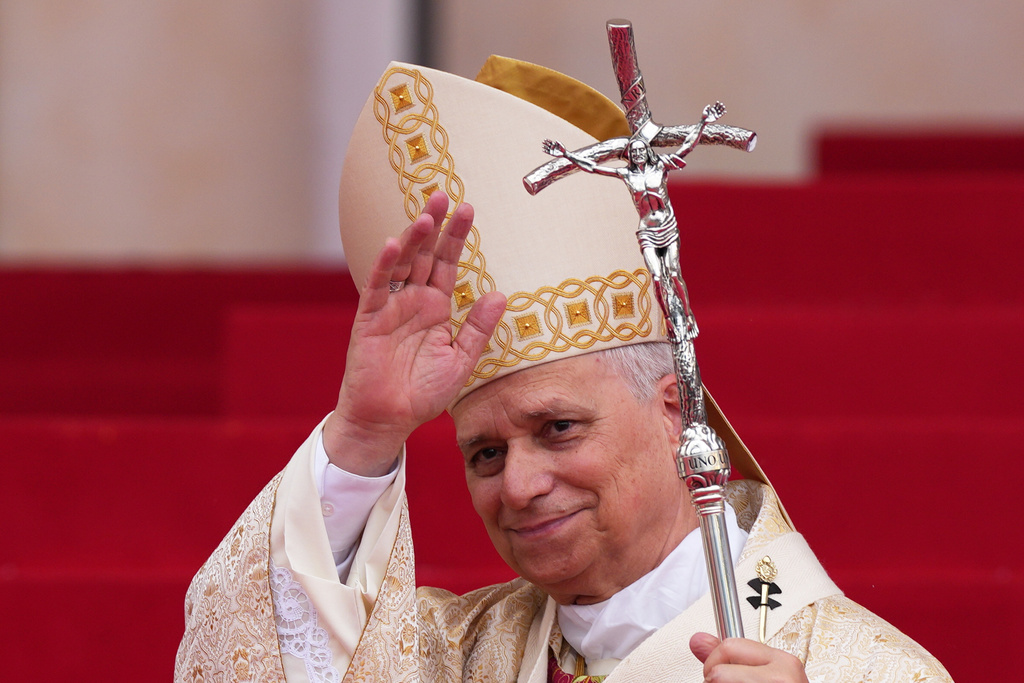 Pope Leo XIV waves as he departs after the Holy Mass at the Malabo Stadium in Malabo, Equatorial Guinea, Thursday, April 23, 2026. (AP Photo/Misper Apawu)