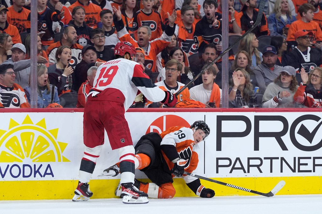 Carolina Hurricanes' K'andre Miller, left, collides with Philadelphia Flyers' Matvei Michkov during the second period of Game 3 in the second round of the NHL hockey Stanley Cup playoffs, Thursday, May 7, 2026, in Philadelphia. (AP Photo/Matt Slocum)