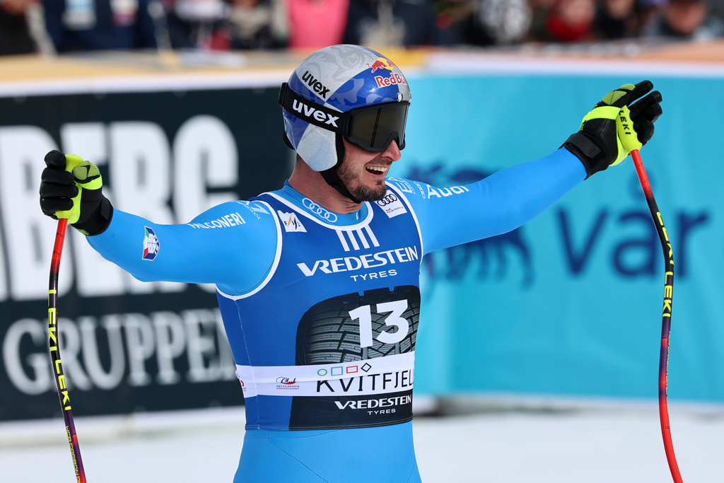 Italy's Dominik Paris celebrates at the finish area of an alpine ski, men's super-G race, at the Lillehammer World Cup Finals, in Kvitfjell, Norway, Sunday, March 22, 2026. (AP Photo/Marco Trovati)