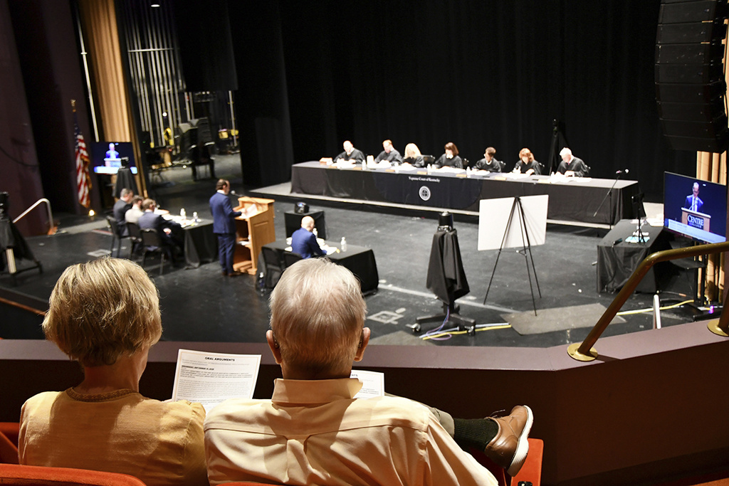 The Kentucky Supreme Court hears oral arguments at Centre College's Norton Center for the Arts in Danville, Ky., Sept. 10, 2025. Seated from left are Justice Shea Nickell, Justice Kelly Thompson, Justice Angela McCormick Bisig, Chief Justice of the Commonwealth Debra Hembree Lambert, Justice Pamela R. Goodwine, Justice Michelle M. Keller and Justice Robert B. Conley. (Jim Hoffman/Administrative Office of the Courts via AP)