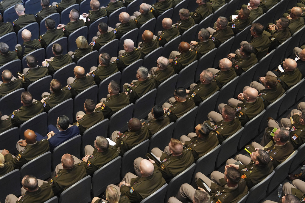 U.S. military senior leadership listen as President Donald Trump speaks at Marine Corps Base Quantico, Tuesday, Sept. 30, 2025 in Quantico, Va. (AP Photo/Evan Vucci)