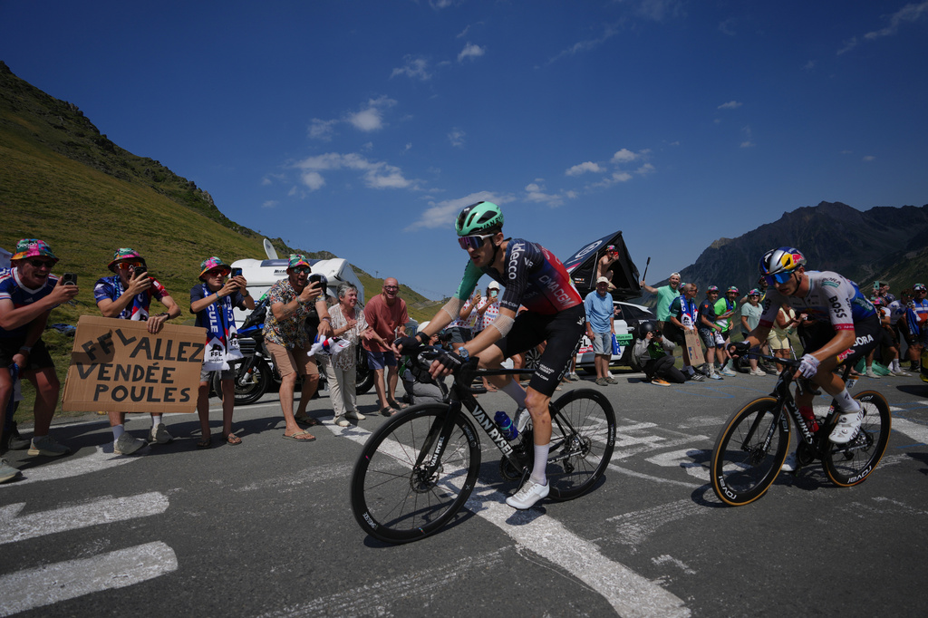France's Paul Seixas, left, rides during the sixth stage of the Tour de France cycling race with start in Pau and finish in Gavarnie-Gedre, France, Thursday, July 9, 2026. (AP Photo/Mosa'ab Elshamy)