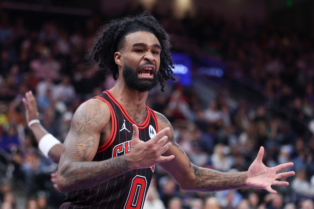 Chicago Bulls guard Coby White reacts to a call against the Utah Jazz during the second overtime of an NBA basketball game, Sunday, Nov. 16, 2025, in Salt Lake City. (AP Photo/Rob Gray)
