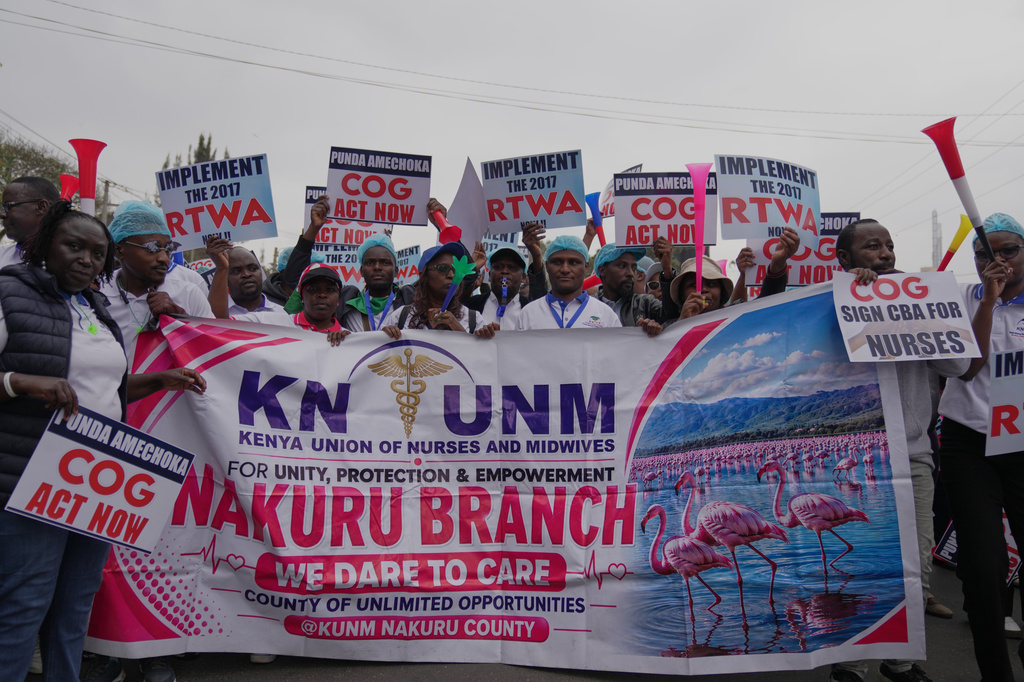 Kenyan nurses and other health workers demonstrate over low pay in Nairobi, Kenya Tuesday, Sept. 8, 2026. (AP Photo/Brian Inganga)
