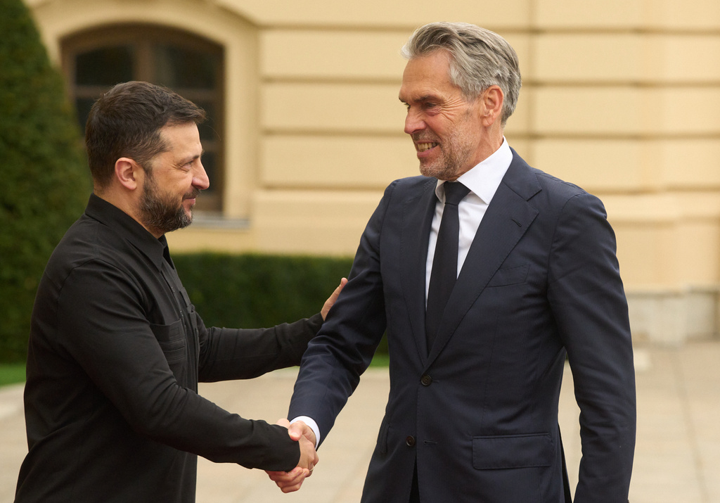 Netherland's Prime Minister Dick Schoof, right, shakes hands with Ukrainian President Volodymyr Zelenskyy during their meeting in Kyiv, Ukraine, Monday, Oct. 6, 2025. (AP Photo/Efrem Lukatsky)