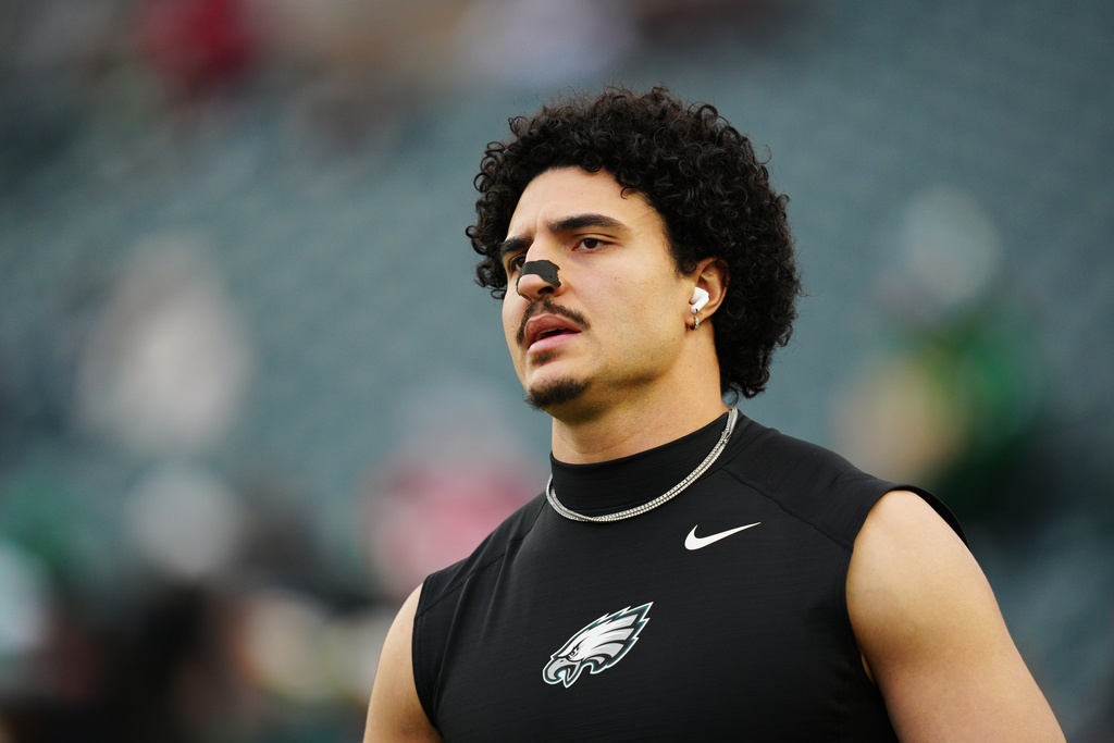 FILE - Philadelphia Eagles linebacker Jaelan Phillips warms up before an NFL wild-card playoff football game against the San Francisco 49ers on Jan. 11, 2026, in Philadelphia. (AP Photo/Derik Hamilton, file)