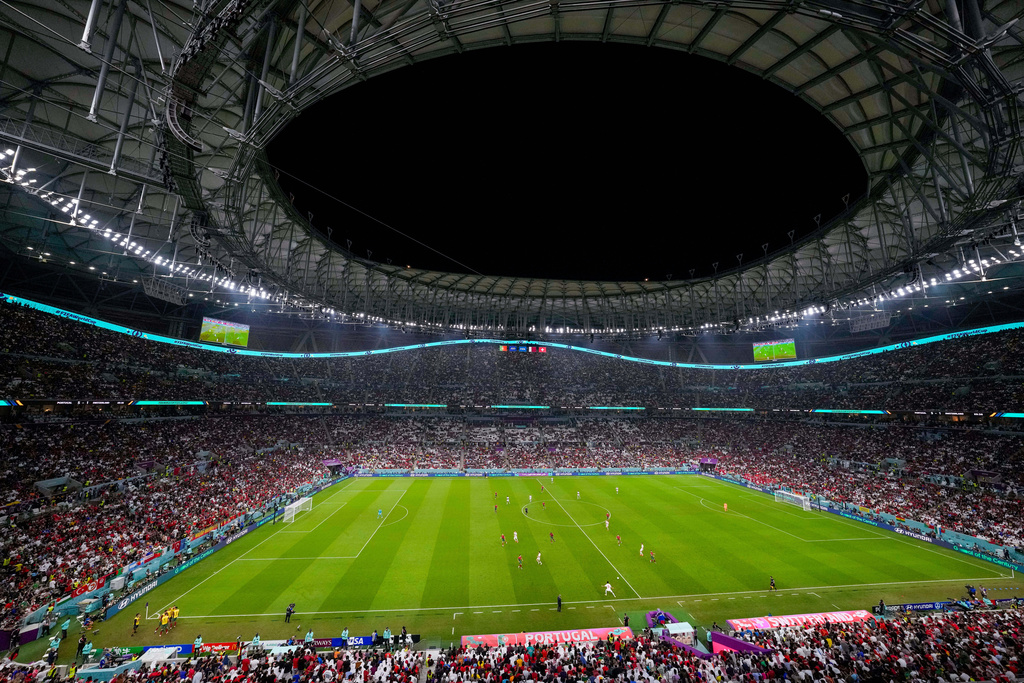 FILE - Spectators fill the stands during the World Cup round of 16 soccer match between Portugal and Switzerland, at the Lusail Stadium in Lusail, Qatar, Dec. 6, 2022. (AP Photo/Frank Augstein, file)