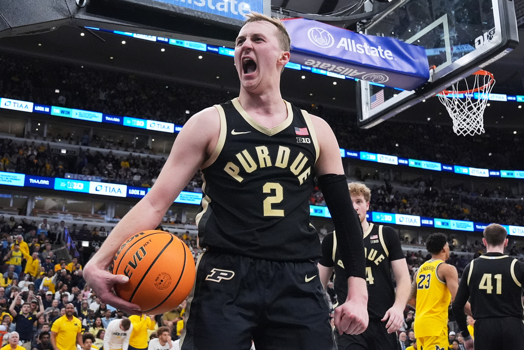 Purdue guard Fletcher Loyer celebrates during the second half of an NCAA college basketball game against Michigan in the championship of the Big 10 Conference tournament, Sunday, March 15, 2026, in Chicago. (AP Photo/Nam Y. Huh)