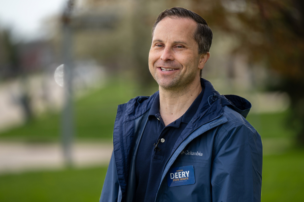 Indiana state Sen. Spencer Deery, R-West Lafayette, who represents District 23, canvasses a neighborhood, Saturday, April 11, 2026, in West Lafayette, Ind. (AP Photo/Doug McSchooler)