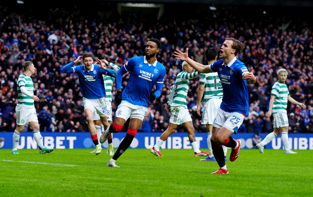 Ranger's Youssef Chermiti, center, celebrates after scoring the opening goal during the Scottish Premiership match between Glasgow Rangers and Celtic Glasgow in Glasgow, Scotland, Sunday, March 1, 2026. ( Jane Barlow/PA via AP)
