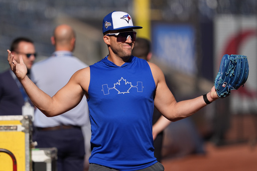Toronto Blue Jays' George Springer walks on the field during batting practice at Yankee Stadium in New York, Monday, Oct. 6, 2025. (AP Photo/Seth Wenig) Toronto Blue Jays' George Springer walks on the field during batting practice at Yankee Stadium in New York, Monday, Oct. 6, 2025. (AP Photo/Seth Wenig)