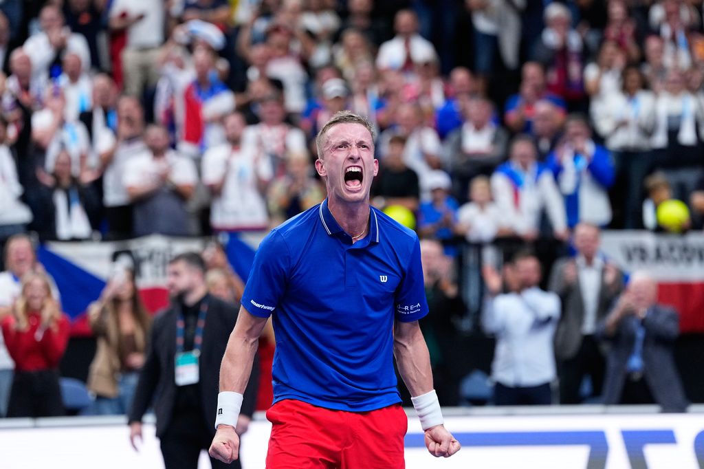 Czechia's Jiri Lehecka celebrates after winning the decisive point against United States' Learner Tien during the Davis Cup second round qualifier match between the Czech Republic and the United States, in Prague, Saturday, Sept. 19, 2026. (AP Photo/Petr David Josek)