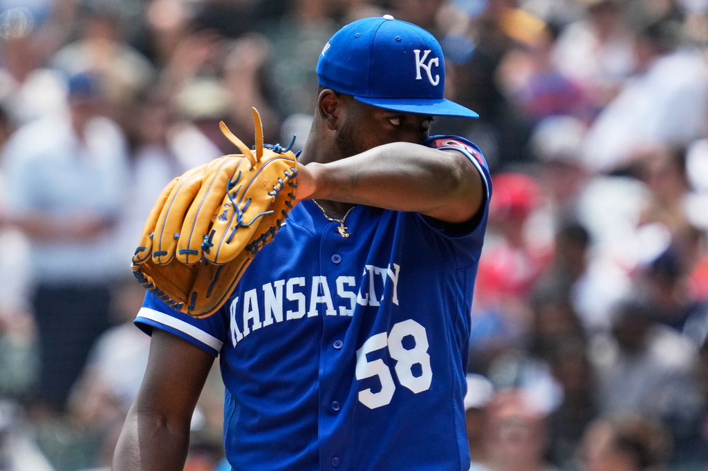 Kansas City Royals starting pitcher Luinder Avila wipes his face during the first inning of a baseball game against the Chicago White Sox in Chicago, Sunday, June 28, 2026. (AP Photo/Nam Y. Huh)