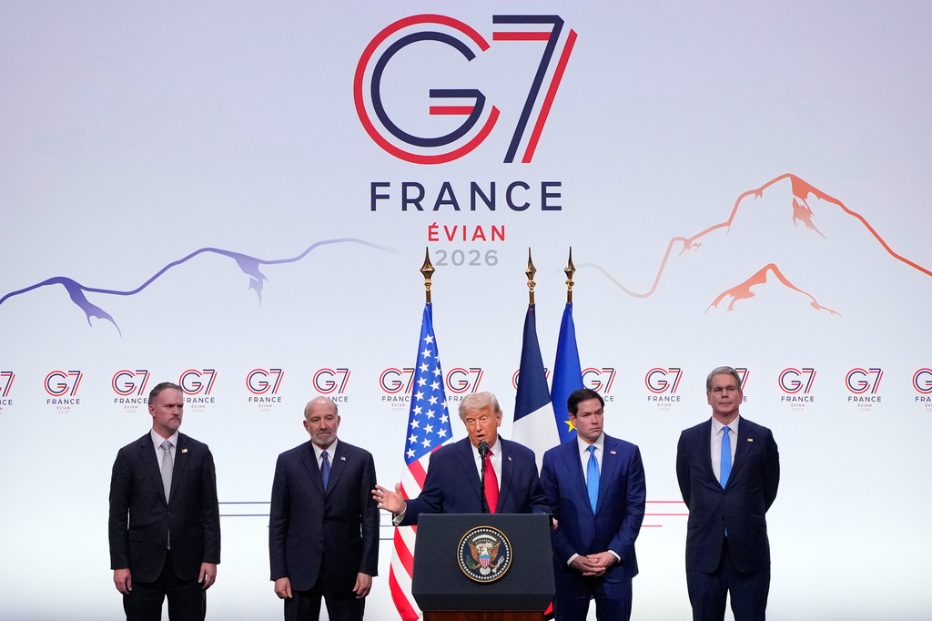 U.S. President Donald Trump, center, speaks as he is flanked by, from left, U.S Trade Representative Jamieson Greer, U.S. Secretary of Commerce Howard Lutnick, United States Secretary of State Marco Rubio and U.S. Treasury Secretary Scott Bessent during a media conference at the end of the G7 summit in Evian-les-Bains, France, Wednesday, June 17, 2026. (AP Photo/Vadim Ghirda)