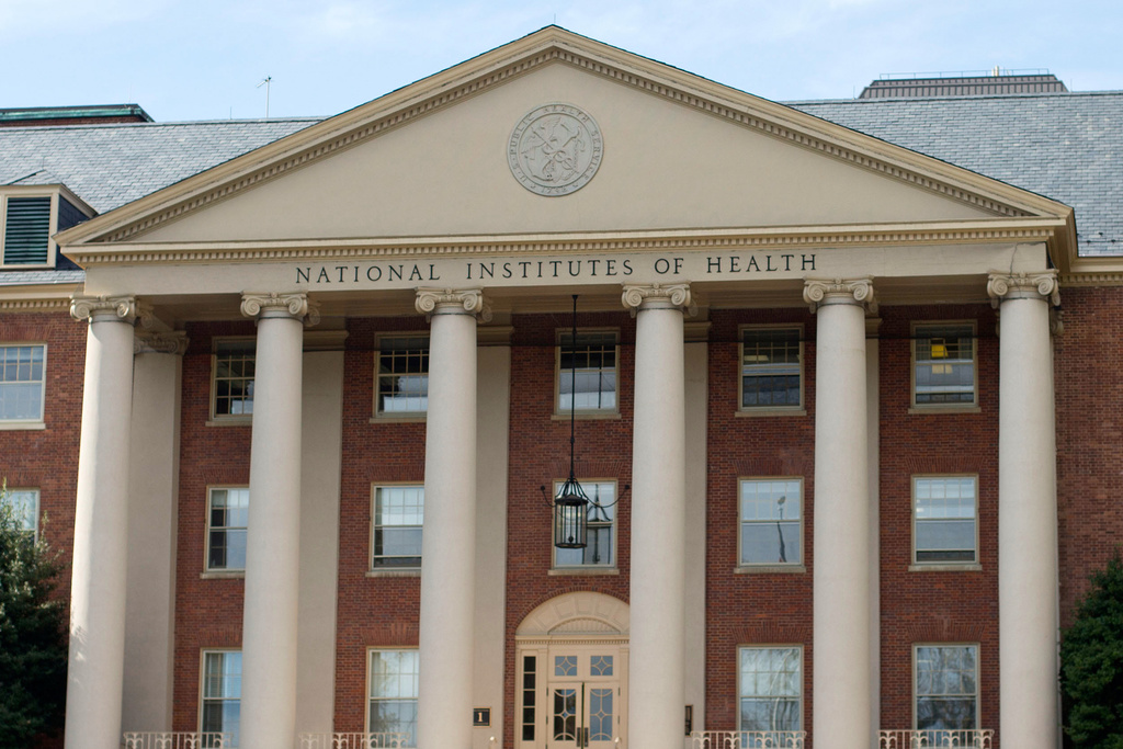 FILE - The National Institutes of Health's James Shannon building is seen on the agency's campus in Bethesda, Md., Oct. 24, 2014. (AP Photo/Pablo Martinez Monsivais, File)