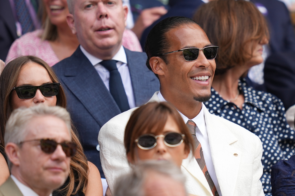 Netherlands football player Virgil van Dijk watches the men's singles semifinal matches from the Royal Box on Center Court at the Wimbledon Tennis Championships in London, Friday, July 10, 2026. (AP Photo/Kirsty Wigglesworth)
