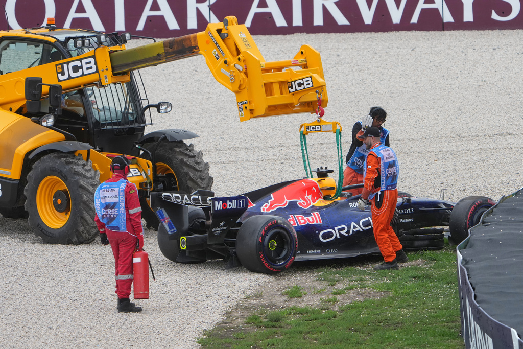 Red Bull driver Max Verstappen of the Netherlands' car is taken from the track after a crash during the qualifying session for the Australian Formula One Grand Prix at Albert Park, in Melbourne, Australia, Saturday, March 7, 2026. (AP Photo/Asanka Brendon Ratnayake)
