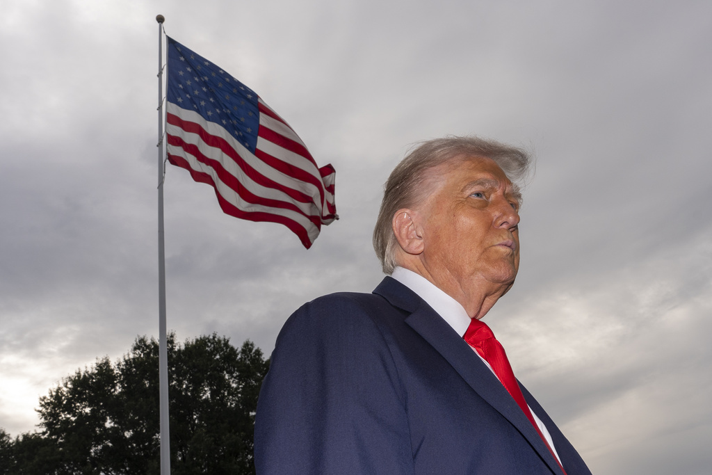President Donald Trump speaks with reporters before departing on Marine One from the South Lawn of the White House, Tuesday, Sept. 16, 2025, in Washington. (AP Photo/Alex Brandon)