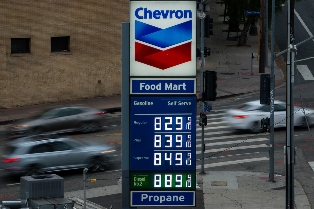 Gas prices are displayed at a Chevron gas station, in downtown Los Angeles, Tuesday, March 31, 2026. (AP Photo/Jae C. Hong)